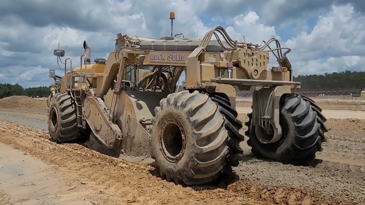 New flotation tires and rims on Caterpillar RM500 reclaimer mixer.