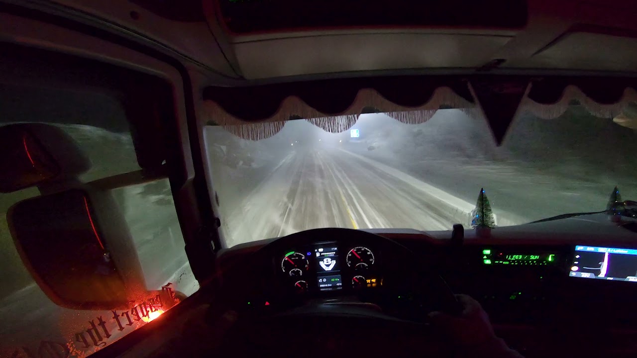Trucking Bjornfjell in extreme weather in northern Norway with Scania V8