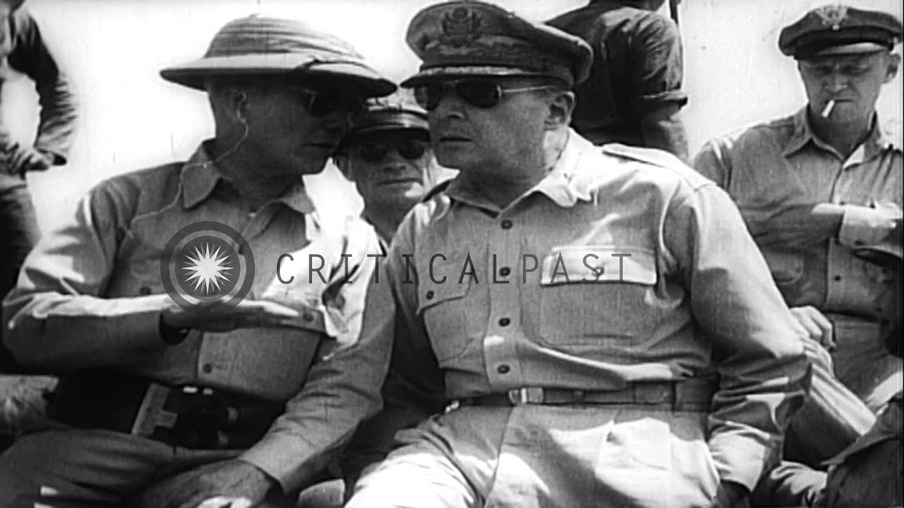 General MacArthur returns to the Philippines; seen wading ashore. HD Stock Footage