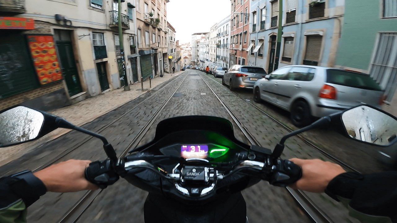 A cold morning in a European city, riding a 125cc scooter