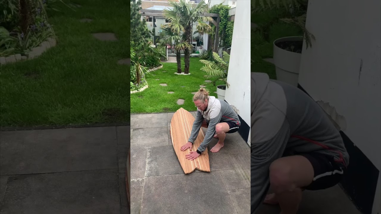 Wooden surfboard + cat 