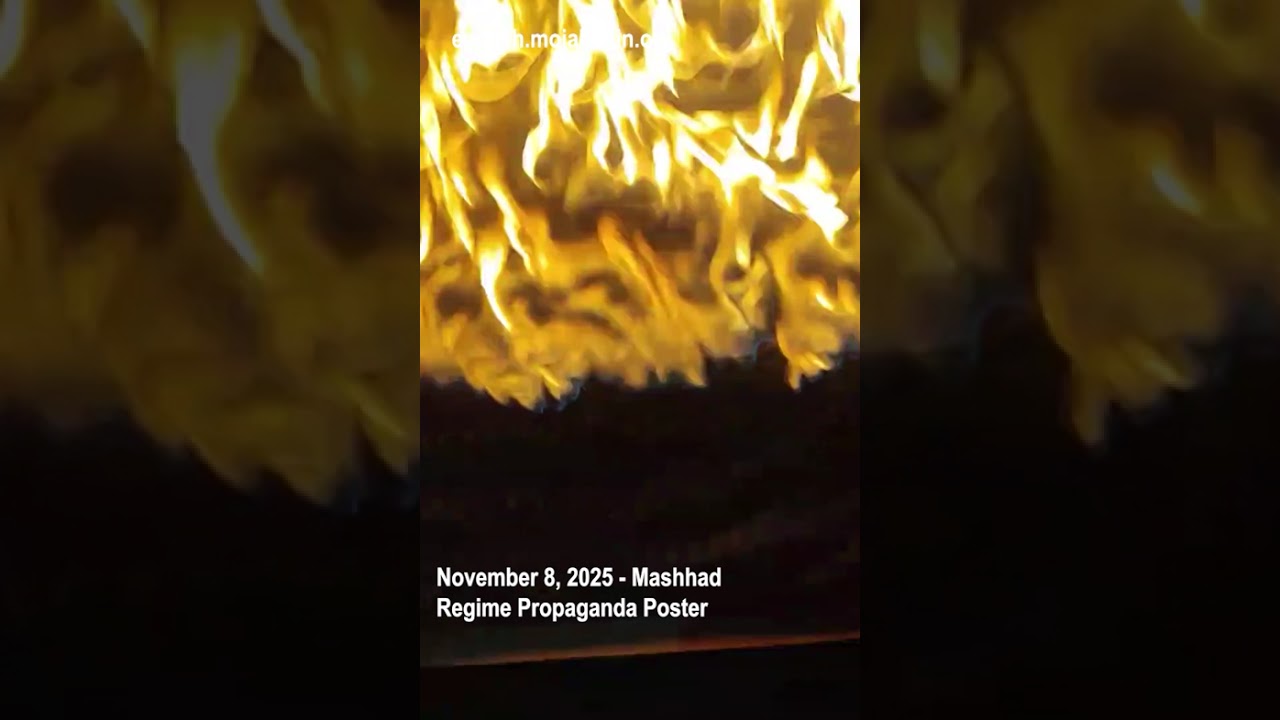Protesters torch regime propaganda poster in Mashhad | Iran protests