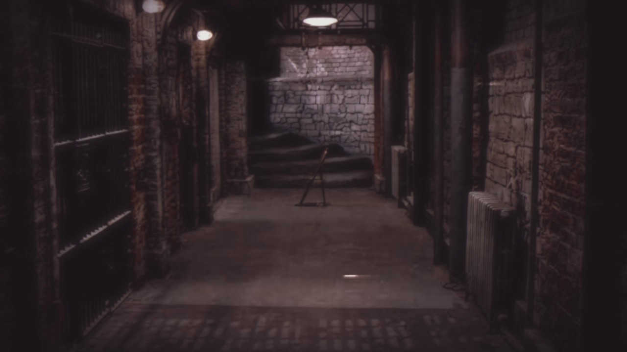 he's in the last cell, past the others