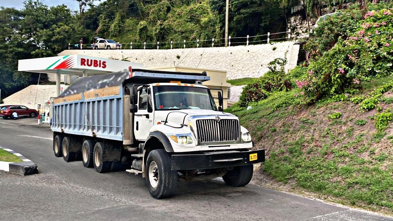 Grenada truckers leaving St George’s port with loads of sand S1:E3