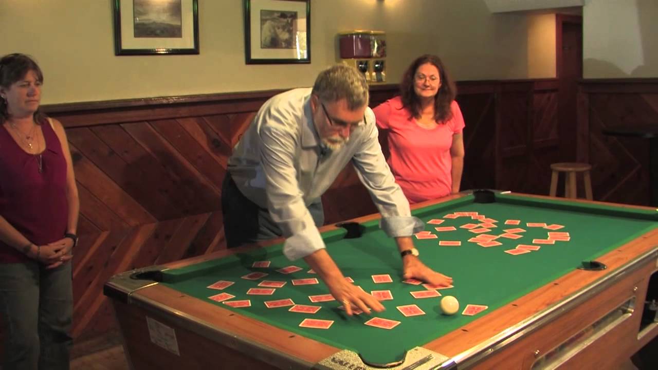 An impossible trick with a pool table, two decks of cards, some skill and a little luck.