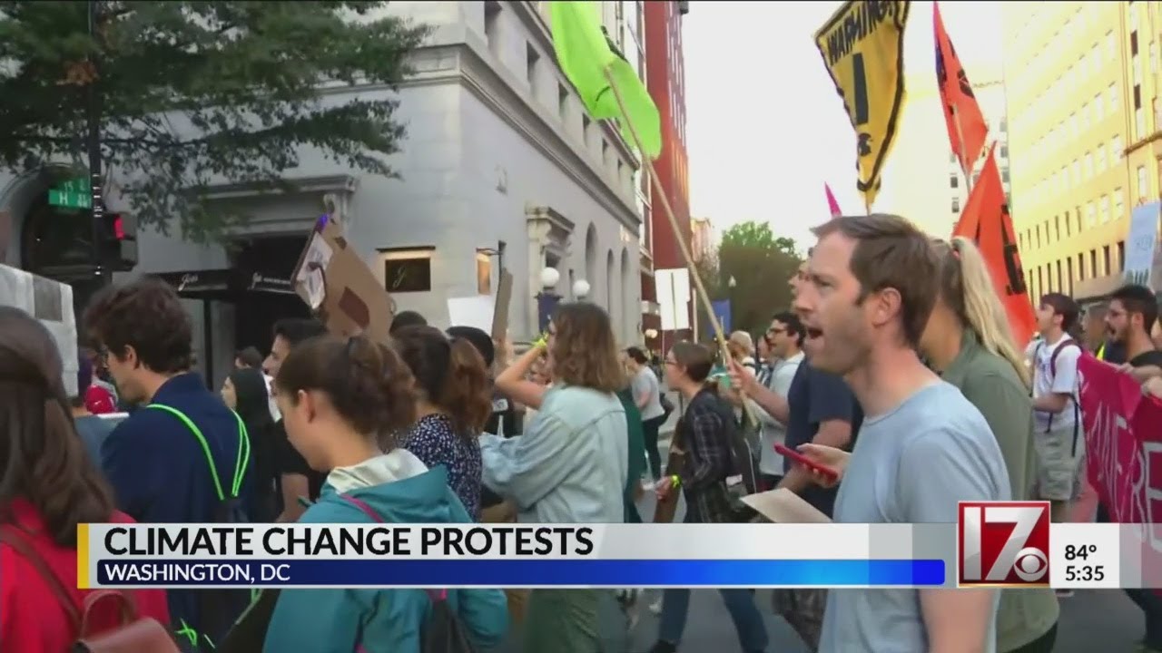 Climate change protesters take to streets in DC