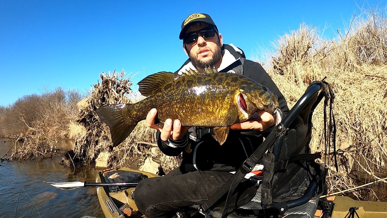 Smashing some BIG Early Spring Smallmouth Bass!!! (Kayak Fishing)