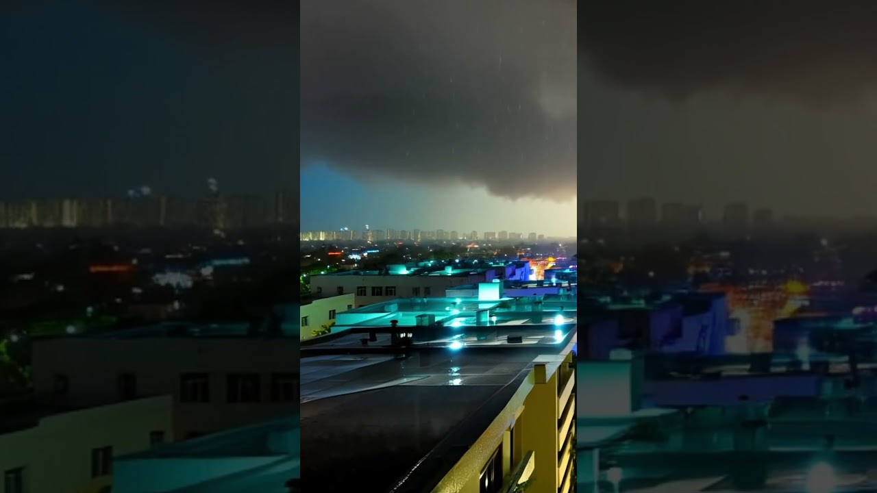 Peaceful Rain on a City Rooftop at Night