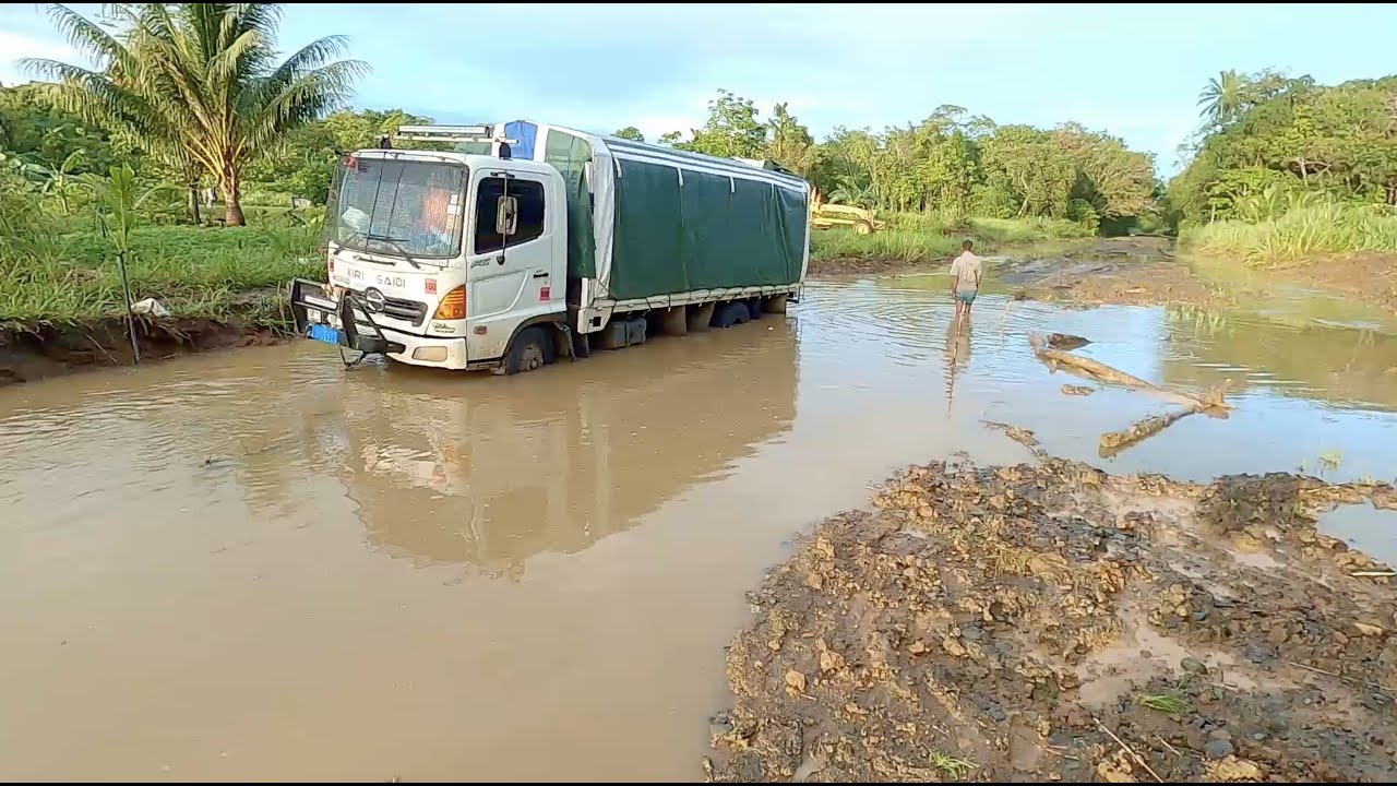 Stories from the Rubber District - Abau: Cloudy Bay Roads | Bay Digital