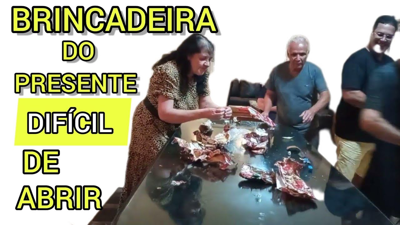 Brincadeira para fazer no Natal. Brincadeira do presente dif&iacute;cil de abrir.