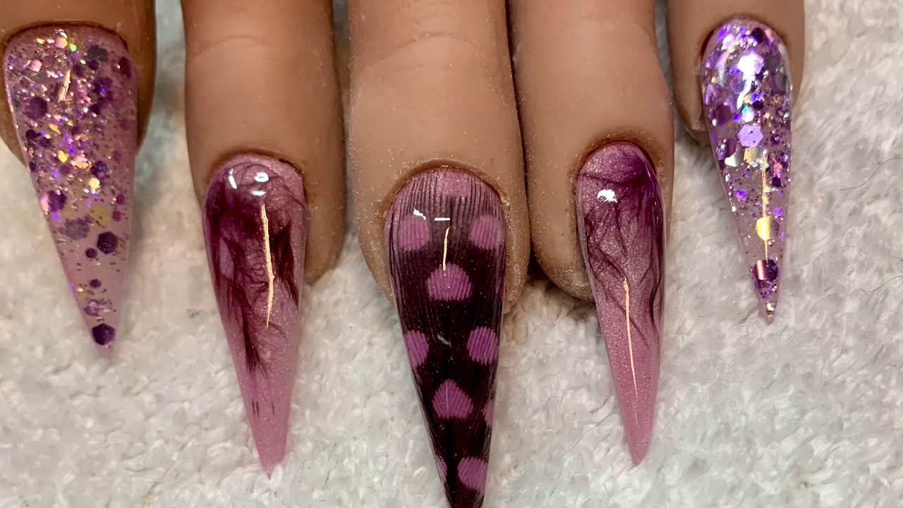 Real feather and acrylic nail art