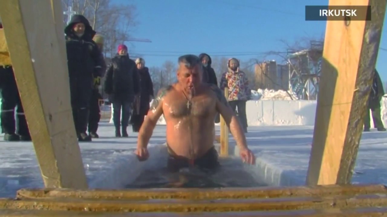 Russians plunge in to icy water to mark Orthodox Epiphany