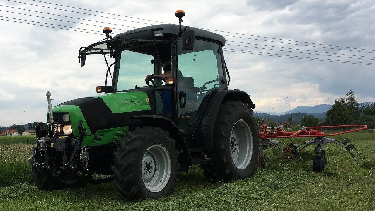 Mowing and tedding grass with Deutz Fahr agroplus 315 ecoline and sip equipment grass silage