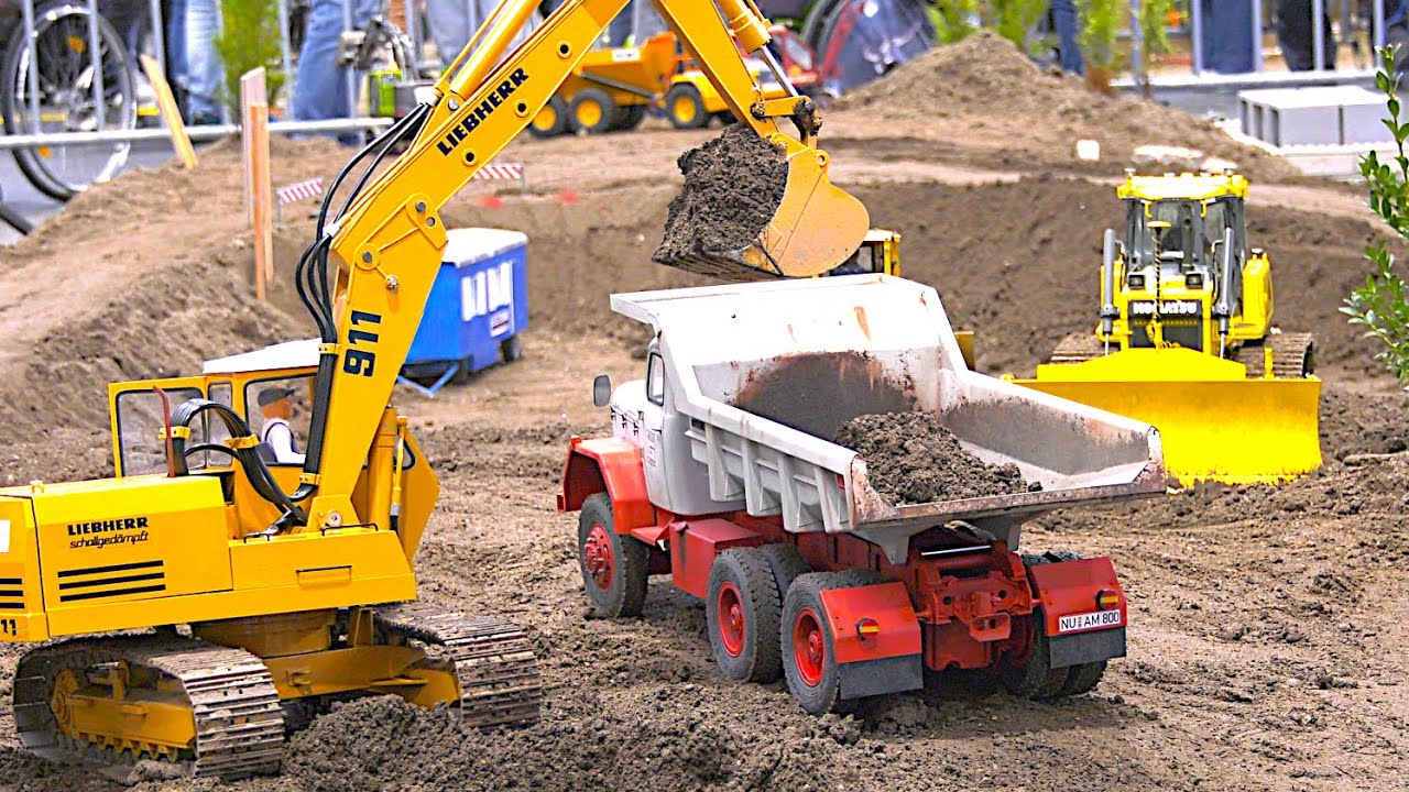 Lots of RC Construction Site Vehicles Excavators Trucks Dozer Modellbaumesse Friedrichshafen 2024