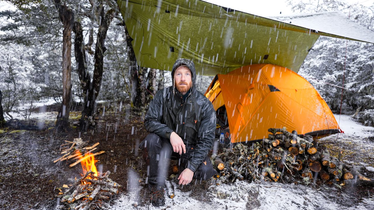 CAMPING IN SNOWSTORM - Heavy SNOW and Heavy RAIN - Winter Tent Camping