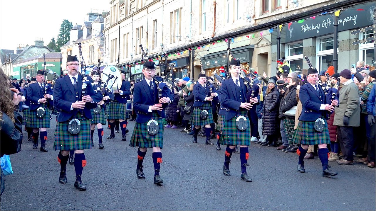 Flett from Flotta by the Vale of Atholl Pipe Band as they march in Pitlochry on New Year's day 2025