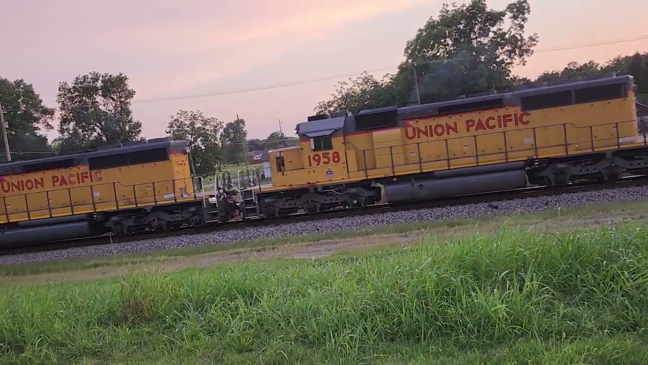 3 SD40-2's Pass By A Crossing