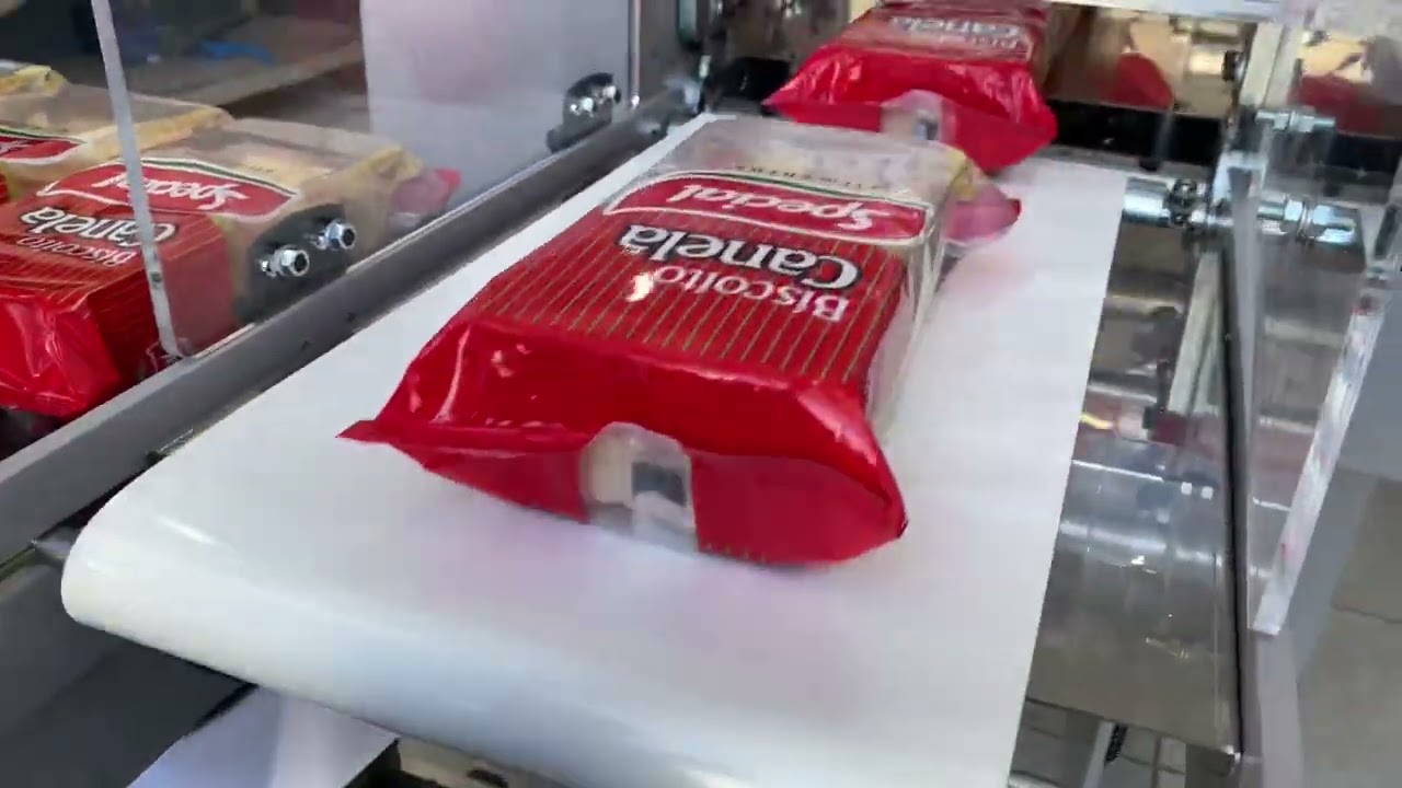 MÁQUINA EMBALADORA FLOW PACK CSD 200 FC EMBALANDO BISCOITO 7 CAPAS!