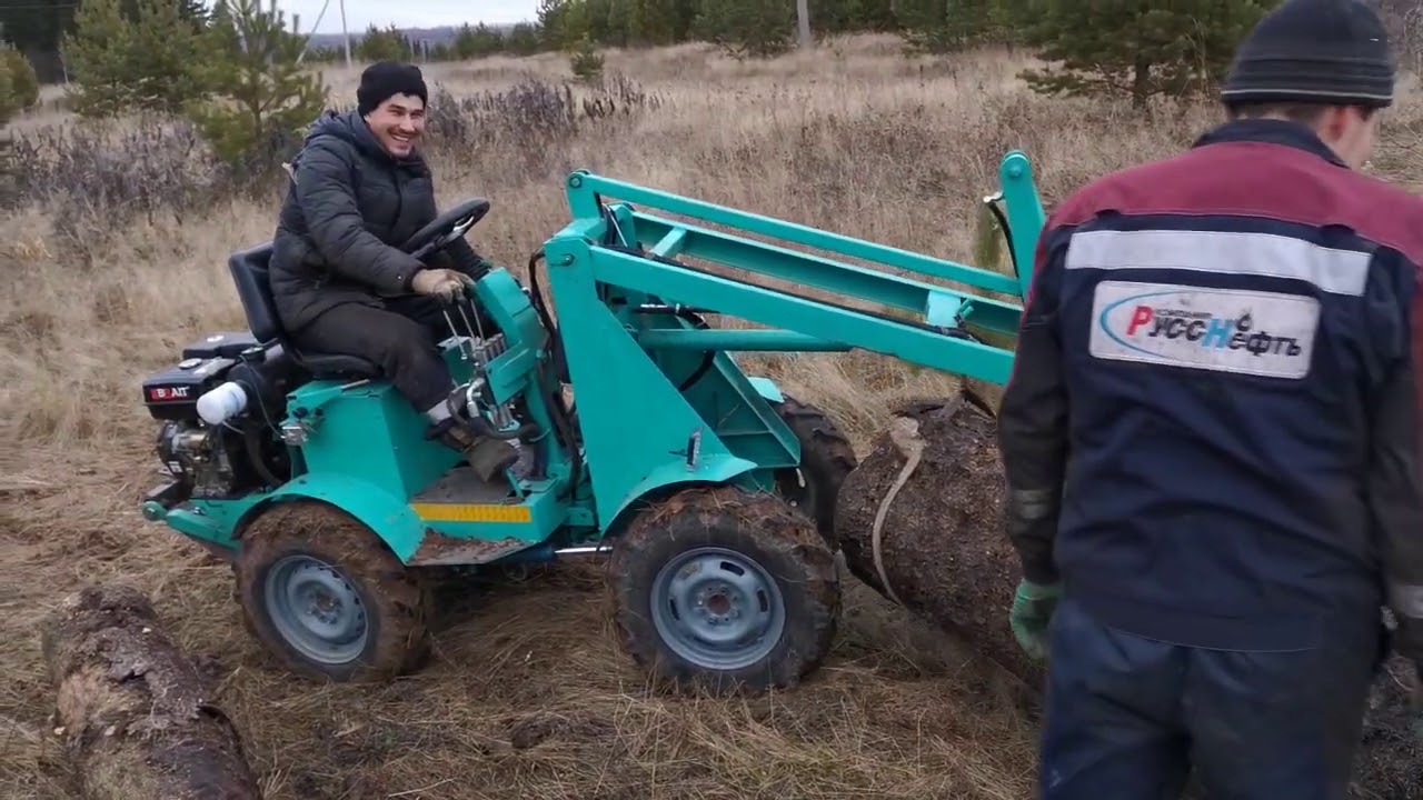 Минипогрузчик  самодельный в работе.
