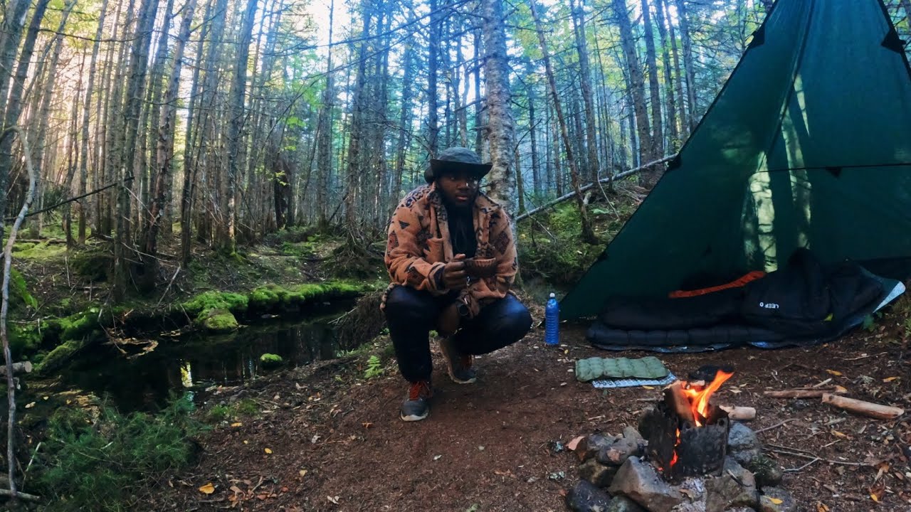 TARP SHELTER CAMPING IN EARLY FALL NEXT TO A CREEK in - 1c ( WATER SOUND)