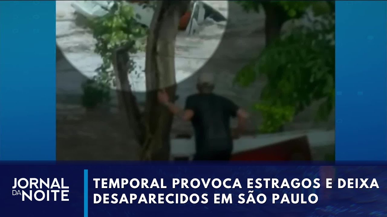 Casal &eacute; arrastado por enxurrada em S&atilde;o Paulo | Jornal da Noite