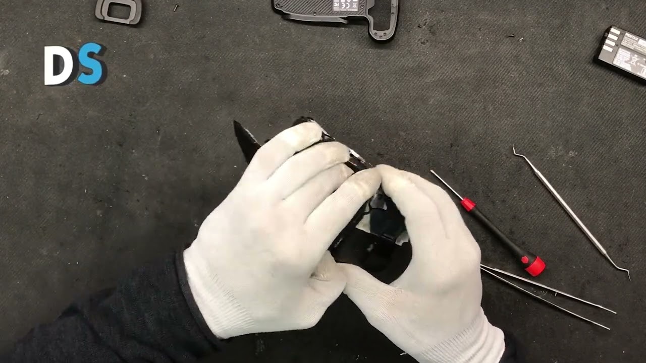 How to repair Pentax DSLR  camera K-S2 - Exchange solenoid (plunger) black picture problem