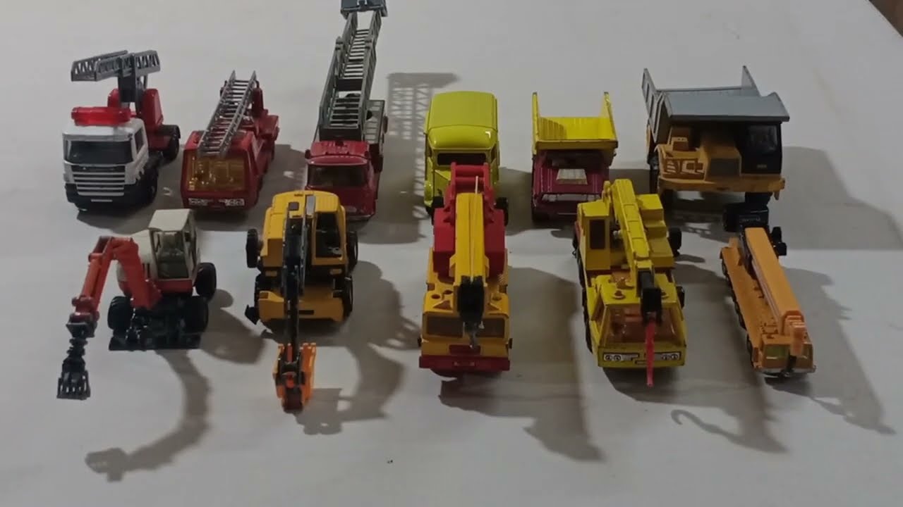 Collection of Diecast Construction Vehicle, Trucks, Cranes, Fire Trucks Etc