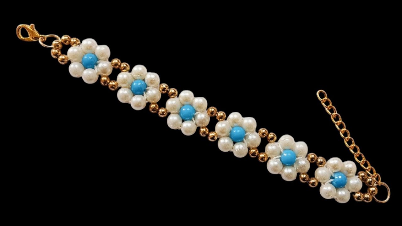 Follow some easy steps and make this beautiful flower bracelet...🩵😍