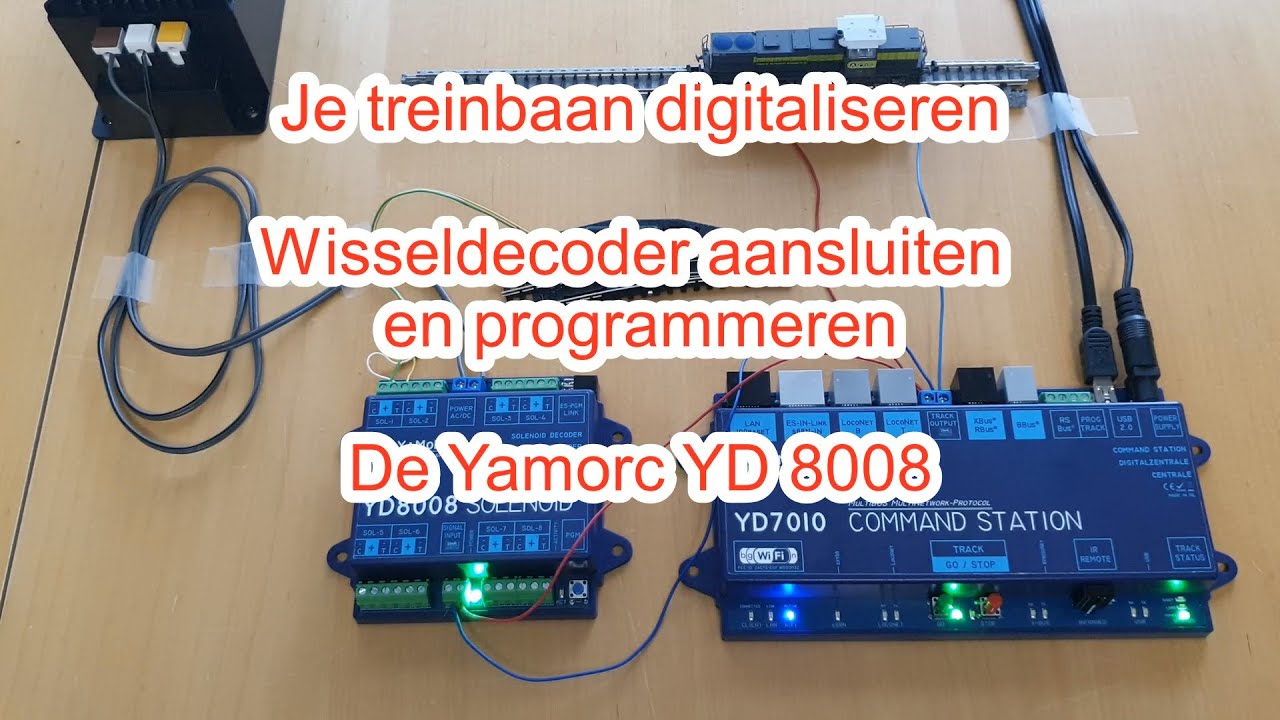 Wisseldecoder aansluiten en programmeren