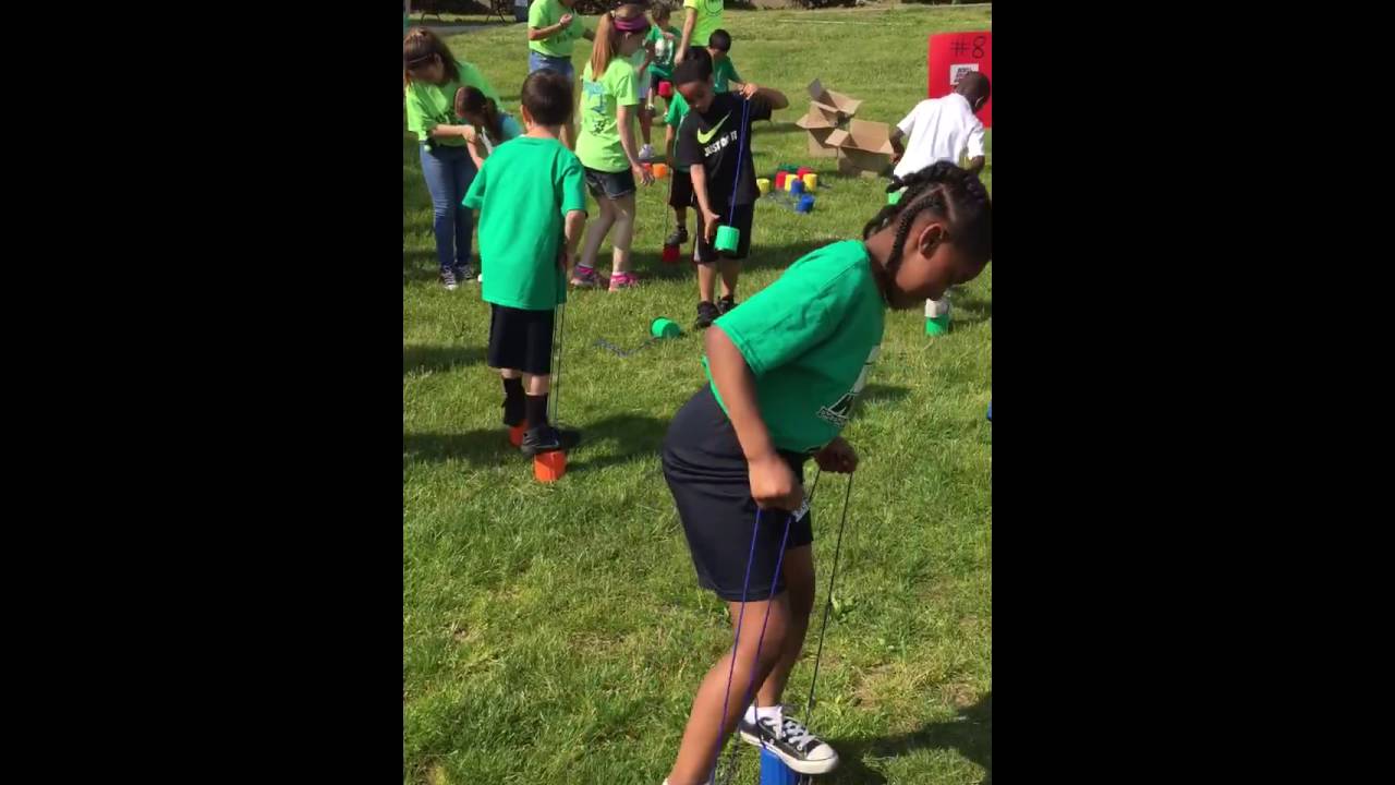 American Ninja Warrior Field Day - Stilt Bucket Walking
