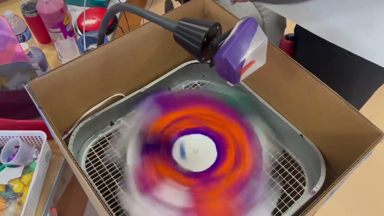 Spin Art with Adaptive Pouring Cup