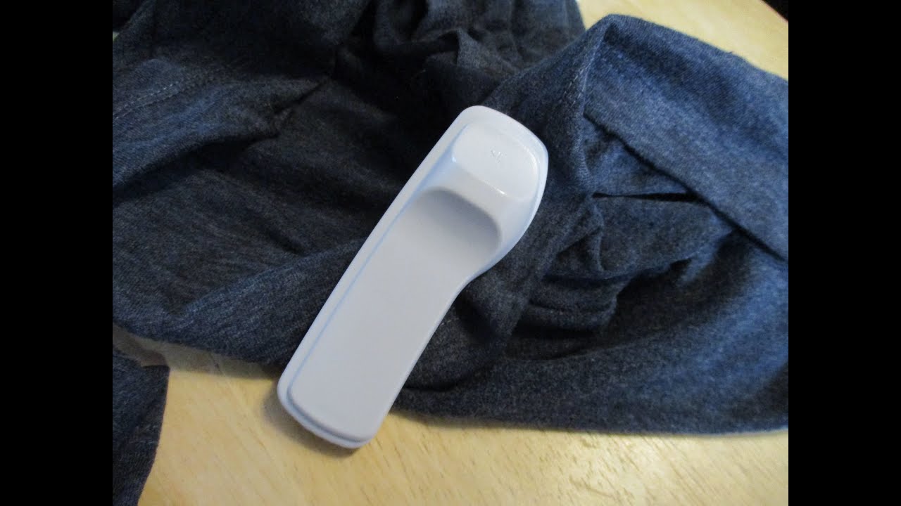 Removing a store security tag from clothing