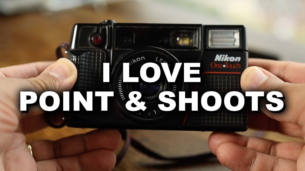 this point & shoot film camera is dope ... my new Nikon One Touch (AF35)