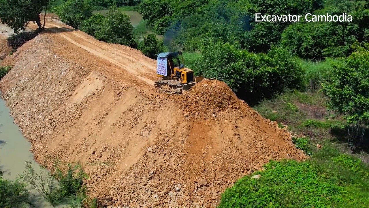 Beautiful Mini Dump Truck Unloading Dirt Into Slope And Small Dozer Pushing & Building New Dam