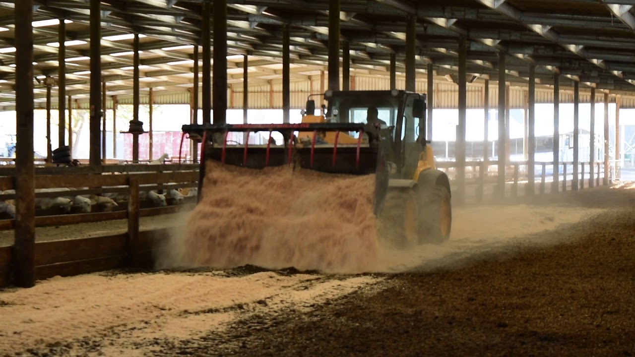 Rata Bucket Grab being used to lay saw dust