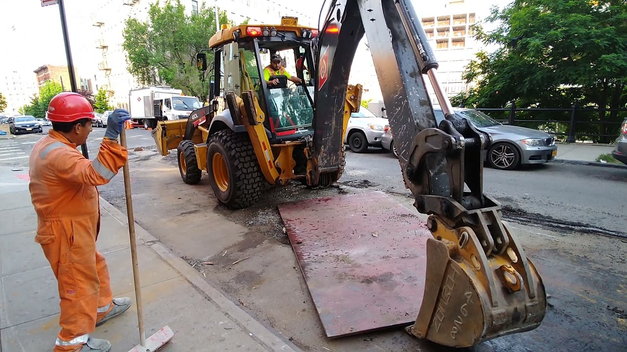 Moving road plates in the Bronx