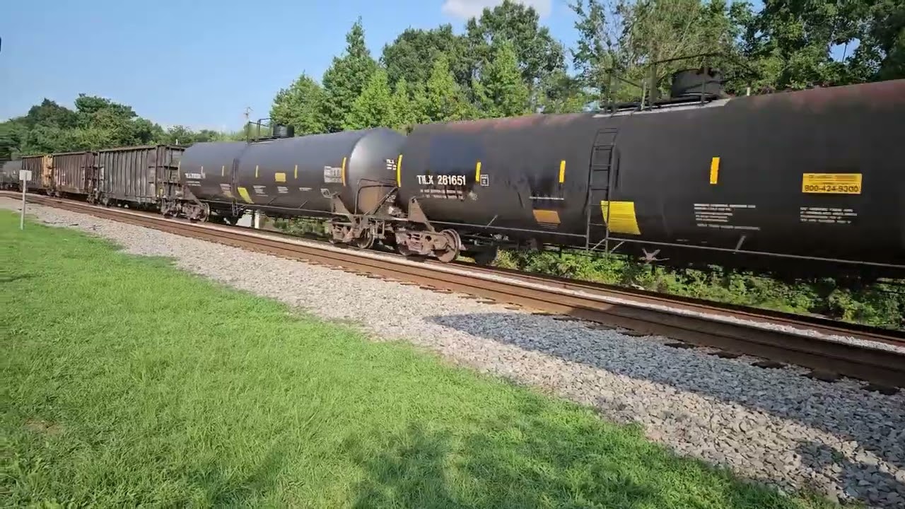 CSX mixed freight train with a DPU