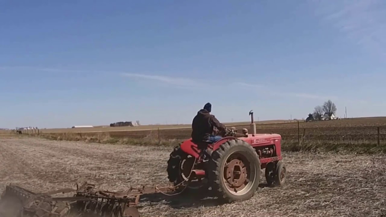 1947 Farmall H pulling a 10' disc