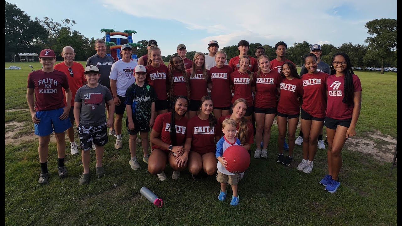 Faith Football and Cheer play kickball with Camp Smile