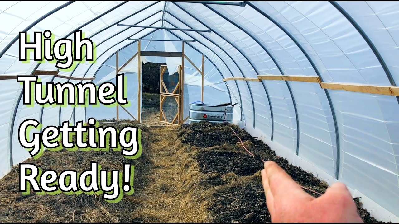 High tunnel skinned and getting ready to Grow!