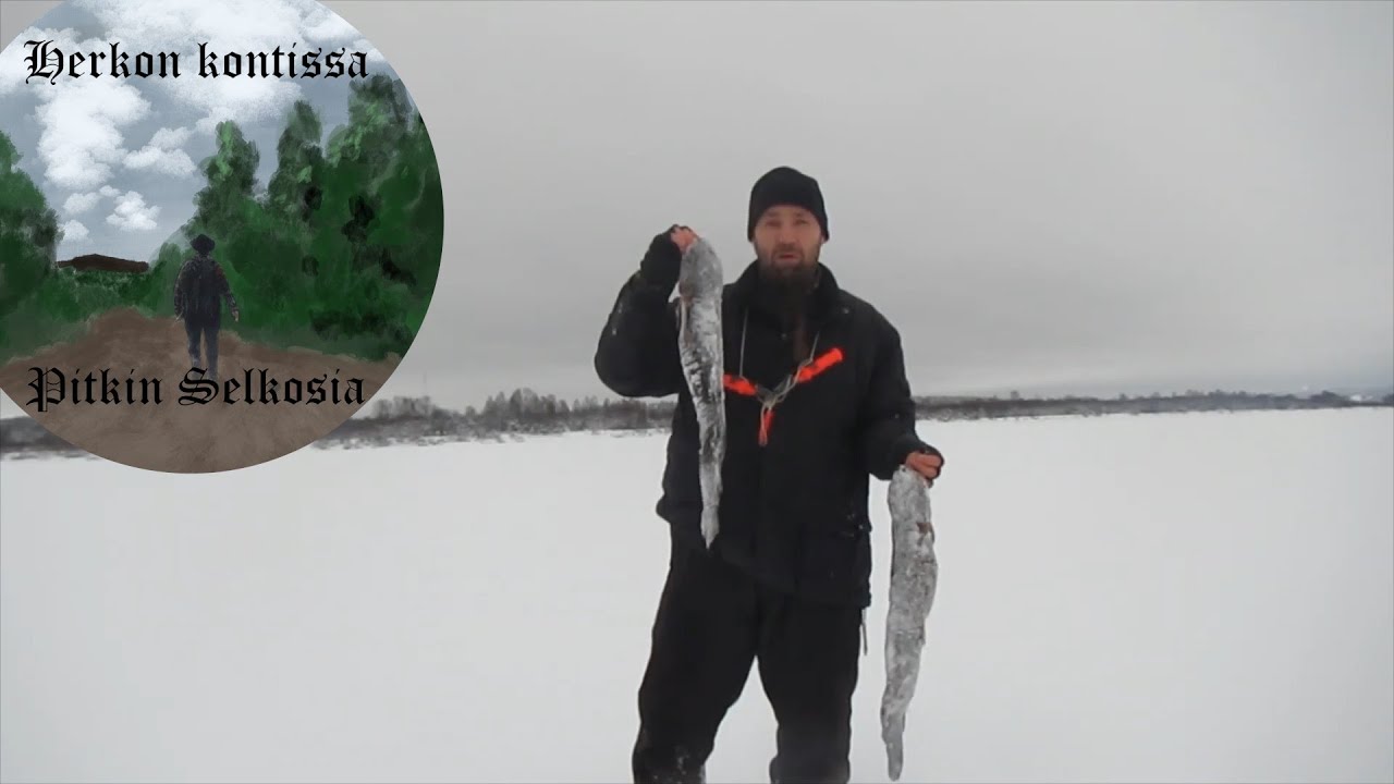 Ounasjoella iskukoukuilla mateita pyytämässä.