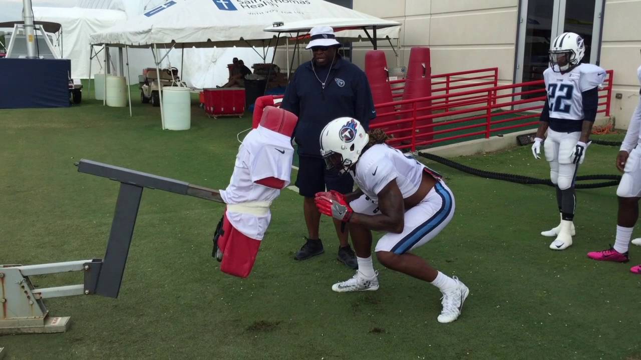 Titans RB Derrick Henry being coached on how to block in the NFL