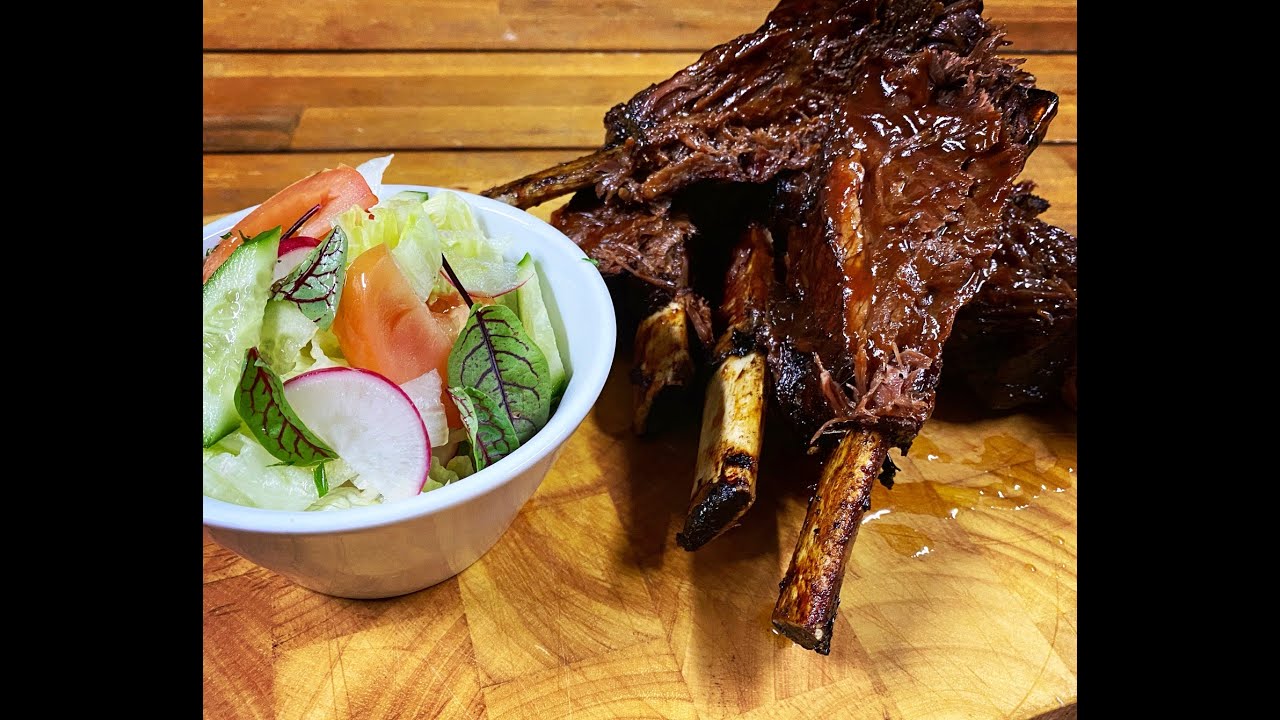 Australian BBQ Beef Ribs slow cooked on a hood gas BBQ.