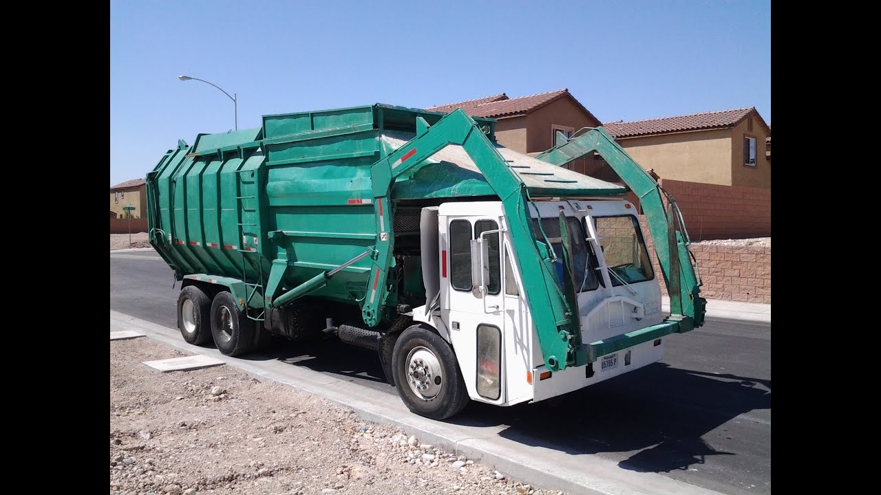 ACC - Crane Carrier Company Amrep Octo Front Loader