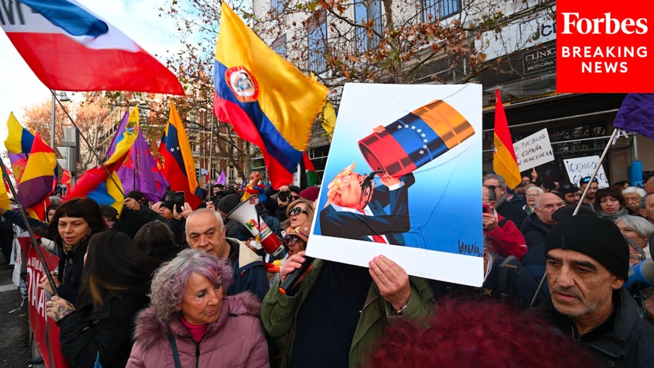 Protesters Rally Against American Actions In Venezuela Outside Of The U.S. Embassy In Madrid, Spain