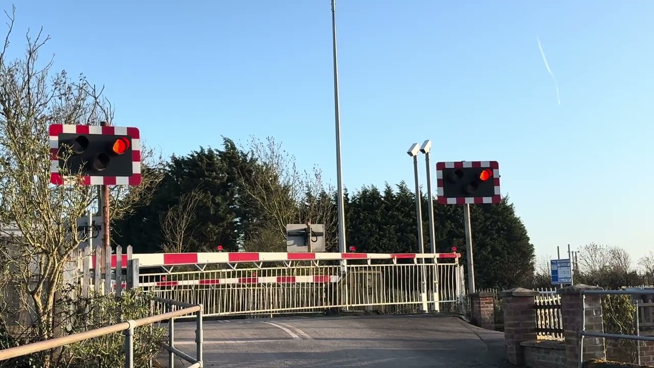 4 trains at Huish Level Crossing 