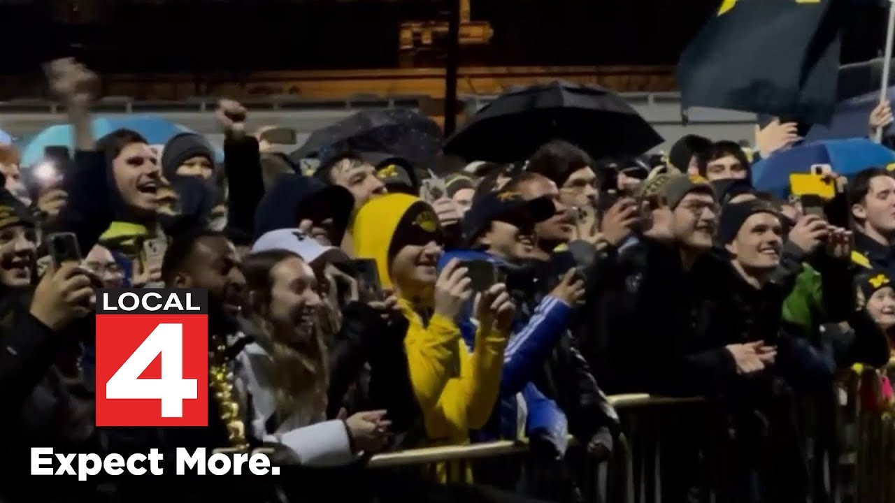 Hundreds of fans brave weather to welcome Michigan Wolverines back to Ann Arbor