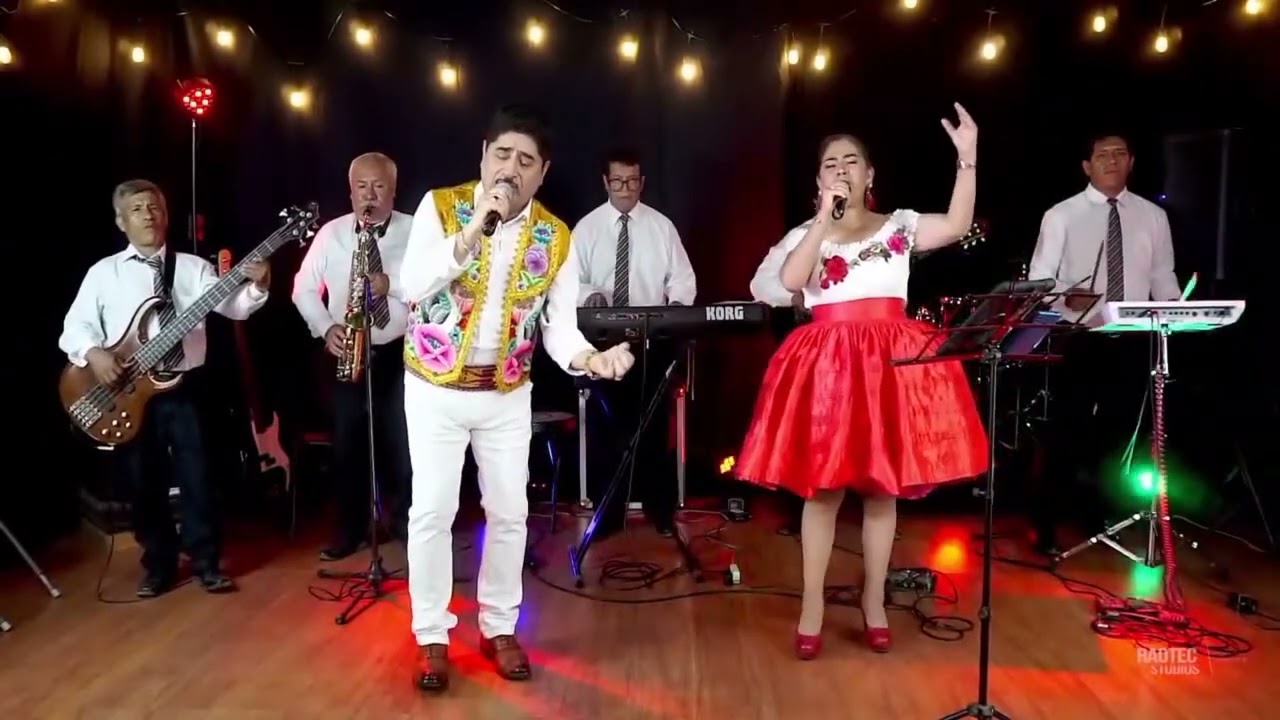 ELEGANTE DEL PERU Y FLOR DE TINTAY