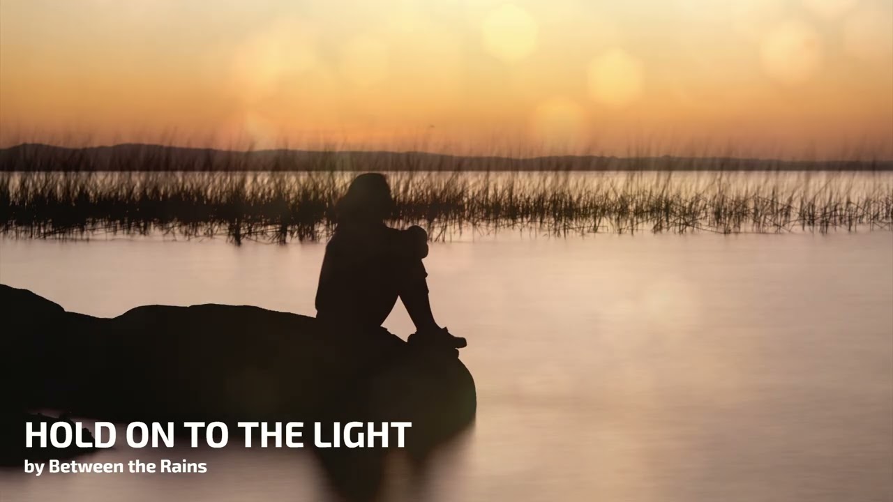 Between the Rains - Hold On To the Light