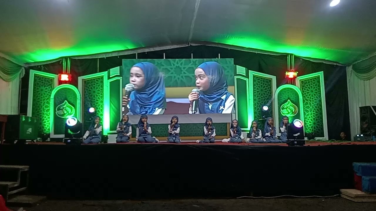 Pembacaan nadhom aqidatul awam oleh siswi Mi Raudhatul mutaallimin Krejengan Probolinggo 